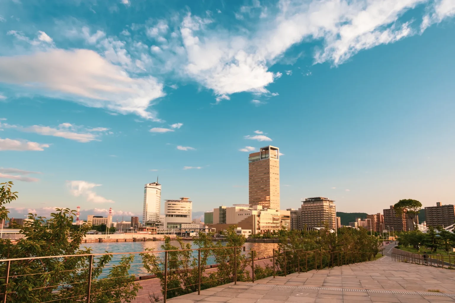 The Sunport Takamatsu waterfront promenade and harbour towers in the evening